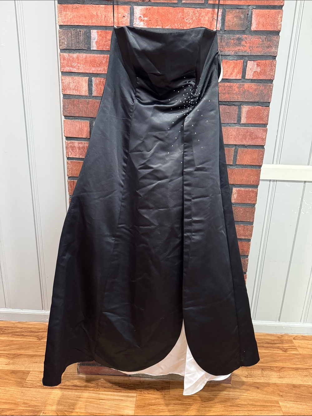 Black Strapless Satin Evening Gown with Subtle Rhinestone Detail